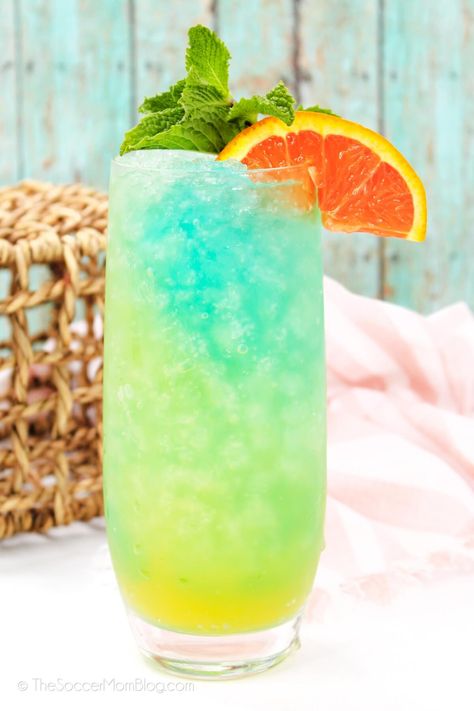 With colorful layers like ocean waves and tropical fruit flavors, this Blue Lagoon Cocktail is as refreshing as a summer breeze! Lake Water Cocktail, Colorful Vodka Cocktails, Layered Cocktails Recipes, Blue Lagoon Drink Recipe, Blue Lagoon Drink, Malibu Cocktail, Curacao Cocktail, Ocean Cocktail, Beef Masala