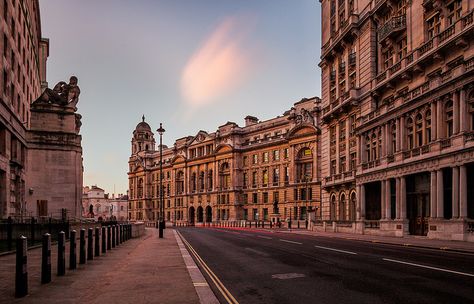 Elegant buildings line the street opposite the Ministry of Defense in Whitehall, London. Grand Buildings, Whitehall London, Bored Of Life, Westminster Bridge, London Pictures, London Hotels, Westminster Abbey, Beautiful Sights, London Eye