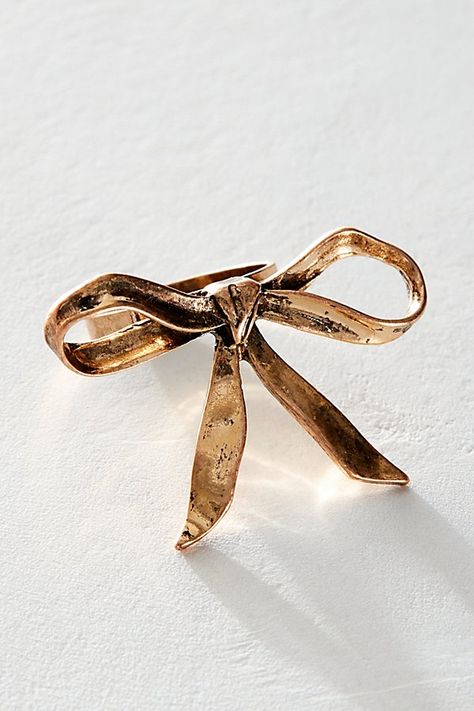 Keep it sweet with this dainty metal bow ring. **Features:** Simple band, bow motif, vintage finish **Why We | Bow Ring by Free People in Gold, Size: 7 Free People Rings, Metal Bow, Boho Necklaces, Simple Band, Bow Decor, Bow Ring, Bold Jewelry, Motif Vintage, Chic Earrings