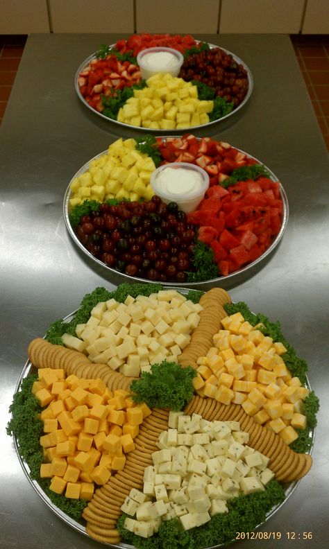 Large trays with fresh fruit and sweet vanilla dipping sauce. Large 4 cheese tray with butter crackers. Tiered Tray Party Food Ideas, How To Arrange A Cheese And Cracker Tray, Veggie Tray For A Crowd, Melon Tray Ideas, Anniversary Food Ideas Party, Cracker Tray, Fruit Platters, Holiday Platters, Fruit Trays