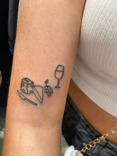 Cheese platter tattoo, mini tattoo, fineline tattoo Wine And Cheese Tattoo, Charcuterie Tattoo, Cheese Tattoo Ideas, Dinner Tattoo, Picnic Tattoo, Breakfast Tattoo, Ratatouille Tattoo, Cheese Tattoo, Quirky Tattoos