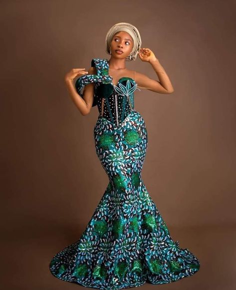 Trendy Ankara styles for every stylish African lady. - Stylish Naija Dramatic Ankara Styles, Ankara Cosette Styles, Traditional Attire For Ladies, Corset Ankara Styles, Ankara Gowns For Wedding, Trendy Ankara Gown Styles, Short Gown Style, Afro Outfits, Latest Ankara Styles For Ladies