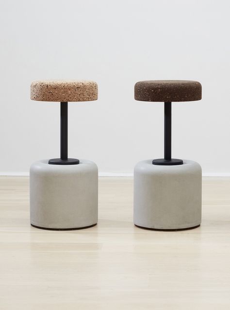 Add a touch of elegance to your indoor living or entertaining area with these beautifully crafted counter & bar stools made from natural light or dark cork, natural grey concrete, and powder-coated mild steel. Built-in ball bearings allow each stool to swivel smoothly. The 100% recyclable cork material is not only durable but also eco-friendly and sustainable. Key Features: Seats crafted from natural, recyclable, light or dark cork. Dark cork suitable for outdoor use. Sturdy concrete base for a solid foundation. Frames constructed with powder-coated mild steel. Equipped with built-in ball bearings for a smooth, 360-degree swivel. Built to withstand the wear and tear of everyday use. Designed by the globally acclaimed Laurie Wiid van Heerden. These stools are perfect for modern homes and ca Concrete Room, Coffee Shop Counter, Concrete Stool, Mobile Coffee Shop, Mobile Coffee, Marble Bar, Shop Stool, Textile Wall Hangings, Cork Material