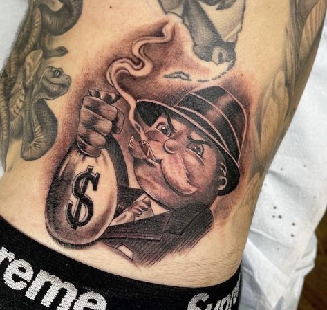 Money Theme Tattoo, Monopoly Man Tattoo, Oakley Tattoo, Get Rich Or Die Trying Tattoo, Money Rose Tattoo, Boxing Tattoos, Money Bag Tattoo, Painless Tattoo, Unique Wrist Tattoos