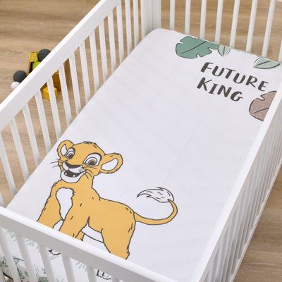 The Disney Lion King Future King Photo Op Fitted Crib Sheet is the perfect addition to your safari themed nursery. This fun pattern features Simba playing among the leaves with a colourful leaf border and words that say "Future King". Comes in shades of teal, sage, taupe and gold. Designed to create the perfect photo opportunity by capturing baby's milestones and special moments and measures 28" x 52" x 8". Includes full elastic edges for a safe and snug fit. Fits a standard size crib mattress a The Lion King Nursery Theme, Lion King Nursery Theme, The Lion King Nursery, Baby Boy Nursery Disney, Winnie The Pooh Nursery Theme, Lion King Nursery Boy, Lion King Nursery Ideas, Jungle Book Nursery, Lion King Nursery