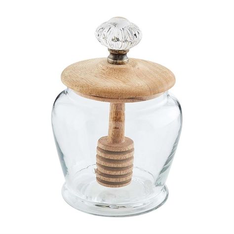 Glass honey jar includes mango wood dipper lid with glass door knob handle. DETAILS Size: 5" x 3 1/4" dia Material: GLASS Care Instructions: WIPE CLEAN WITH DAMP CLOTH Mud Pie Kitchen, Honey Dispenser, Glass Door Knob, Kitchen Details, Glass Door Knobs, Wood Pedestal, House Things, Honey Jar, Glass Knobs