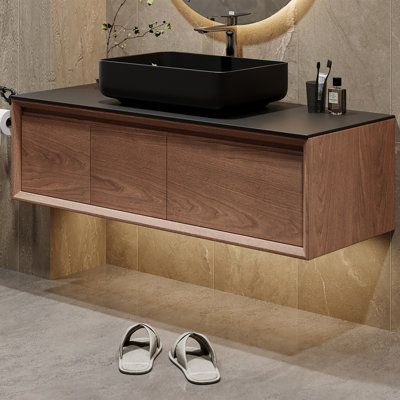 Create the ideal bathroom space, choose our bathroom cabinets with rock slab countertops, single multi-layer solid wood cabinets with cushioned rails and cushioned door hinges, a quality choice that you can trust. | Winston Porter Neeli 47.6 Single Bathroom Vanity w / Top 14.7 H x 47.6 W x 19.7 D in Wood / Marble in Brown | 14.7" H X 47.6" W X 19.7" D | Wayfair Black Vanity Wood Top, Floating Walnut Vanity, Small Bathroom Vanity Designs, Powder Room Floating Vanity, Walnut Vanity Bathroom, Brown And Black Bathroom, Bathroom Black Countertop, Wood Cabinets Bathroom, Brown Marble Bathroom