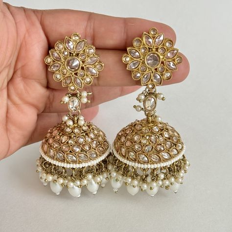 Antique Polki kundan Jhumka/stone Jhumka/Indian Jewelry/Pakistani /Punjabi Jewelry/Statement earring/Bridal earrings/wedding collection Length 3.25 inches This is 100% Handmade jewelry. So Color, shades, texture displayed may slightly vary from the actual product due to digital image limitations. We request you to consider these minor variations. Please expect the possibility of some slight imperfections when buying hand made jewelry. If you have any questions, please message or email us. Arrive Pakistani Jewelry Earrings, Desi Jewellery, Kundan Jhumka, Punjabi Jewelry, Desi Jewelry, Aesthetic Jewellery, Earring Bridal, Jewelry Pakistani, Fancy Jewellery Designs