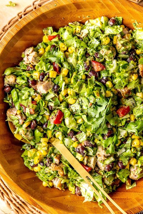 Loaded with flavor, this colorful Southwestern Micro-Chopped Salad with Cilantro Lime Dressing is anything but boring! Salad With Cilantro Lime Dressing, Tex Mex Salad, Southwestern Chopped Salad, Spicy Cashews, Sweet Potato Kale, Romaine Salad, Cilantro Lime Dressing, Crispy Chickpeas, Yummy Salad Recipes