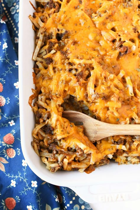 Easy Baked Taco Hashbrown Casserole - Sizzling Eats Taco Bake Casserole With Hashbrowns, Ground Turkey And Hashbrown Recipes, Shredded Hashbrown Taco Casserole, Ground Beef Shredded Hashbrown, Mexican Hashbrown Taco Casserole, Cheesy Taco Hashbrown Casserole, Taco Potatoes Casserole Oven, Taco Casserole With Hashbrowns, Hot Dog Hashbrown Casserole