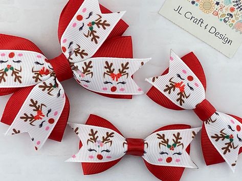 Reindeer Gingham Hair Bow  come in 2 sizes. 3.75 inches and 2.5 inches.  Your choice of Clip, Hair Tie or Nylon headband (Soft and stretchy, one size fits newborn to toddler) The alligator clip is fully lined with matching grosgrain ribbon. All ribbon has been heat sealed in order to prevent fraying. Don't forget to check out more bows from my Etsy shop  https://www.etsy.com/shop/jlcraftdesign?ref=simple-shop-header-name&listing_id=1008031491§ion_id=32025431 * PLEASE READ BOW SIZES BEFORE YOU OR Christmas Hair Bow Ideas, Christmas Hair Bows Diy, Diy Baby Bows Headbands, Reindeer Hair, Newborn Hair Bows, Christmas Hair Clips, Christmas Hair Clip, Diy Baby Bows, Woman Costumes