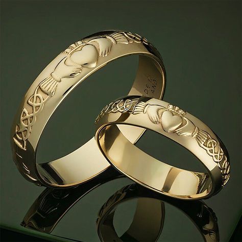 14k Gold Claddagh Wedding Rings | Men's and Women's Irish / Celtic Wedding Bands Stunning matching gold wedding bands! Handmade in Ireland and Irish Hallmarked 14k Gold in Dublin Castle. Each ring sold individually. The iconic 17th century symbol evokes love, loyalty, devotion and friendship. It echoes the words of the Irish sailor who first created this design: “With these hands I give you my heart, and I crown it with my love”. Material: 14k gold.Approx. Ring Weight: 3.1 grams for women's, 4.5