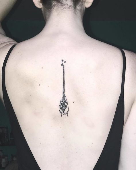 20+ Of The Best Spine Tattoo Ideas Ever Wand Spine Tattoo, Slytherin Tattoo, Girl Spine Tattoos, Valley Tattoo, Cream Tattoo, Flower Spine Tattoos, Wand Tattoo, Hp Tattoo, Bauch Tattoos