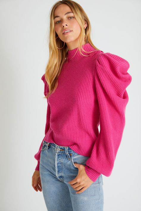 Our Potter Pullover brings the drama, making its entrance in 100% cashmere with a ribbed knit texture and decorative cotton voile bow details at the shoulders. This draped mock turtleneck sweater is impossibly soft with a relaxed fit and exaggerated mutton sleeves with tall cuffs at sleeve opening. With jeans or a skirt, this cozy layer elevates the everyday. Shown here in Electric Pink. Mock Turtleneck Sweater, Puff Sleeve Sweater, Jacquard Sweater, Sweater Collection, Women Lifestyle, Long Puff Sleeves, Mock Neck Sweater, Pink Sweater, Cashmere Sweaters