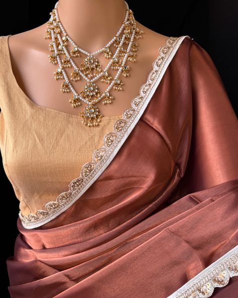 Rust brown organza saree with contrast White golden lace all over sarees. Saree alone To find this product in website: Www.thejacouture.in >organza sarees> Rust brown organza saree. Jewellery collaboration: @anvi__jewellery #organzasaree #trendingsaree #traditional #organzalacesaree #lacesarees #sarees #sareelove #brownsaree Marron Saree With Contrast Blouse, Organza Saree Jewellery, Brown Saree With Contrast Blouse, Golden Saree With Contrast Blouse, Brown Organza Saree, Net Saree Designs, Golden Saree, Saree Jewellery, Lace Saree