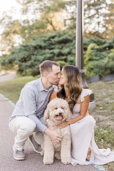 Engagement photos with dog in Saint Paul, Minnesota with goldendoodle Dog In Engagement Photos, Puppy Engagement Pictures, Couple With Dog Poses, Couple Pictures With Dogs Fall, Engagement Photo Dog, Engagement Session With Dog, Engagement Photoshoot Ideas With Dogs, Engagement Pics With Dog, Engagement Photos Poses With Dog