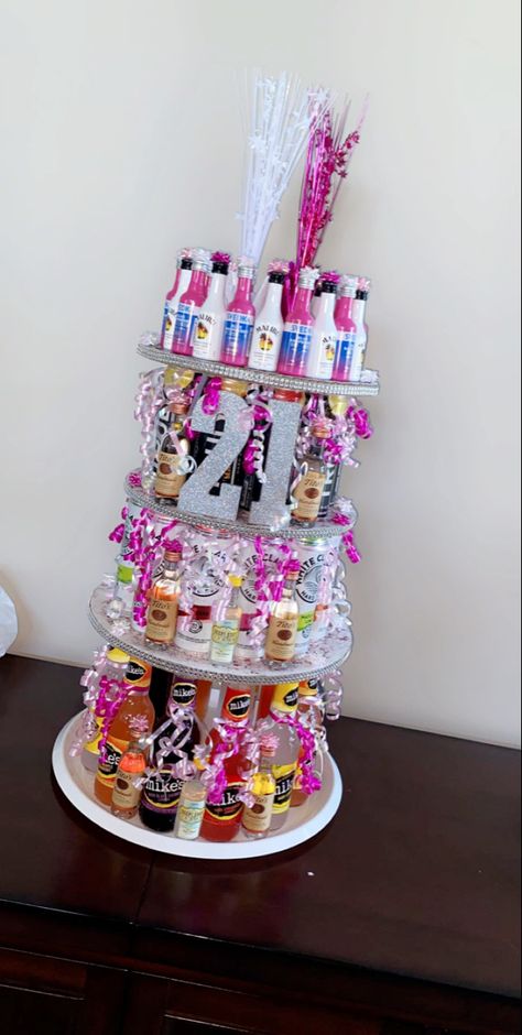 21st Birthday Keepsake Ideas, 21st Birthday Gift Wrapping Ideas, Party Favors 21st Birthday, 21st Birthday Drink Tower, 21st Birthday Alcohol Cake Tower, Spring 21st Birthday Party, Drink Tower Birthday, 21st Alcohol Tower, 21st Birthday Alcohol Basket