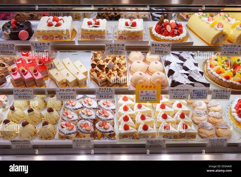 Download this stock image: Cakes and pastries on a display at a Japanese bakery. Tokyo, Japan. - E034AW from Alamy's library of millions of high resolution stock photos, illustrations and vectors. Japan Cake, Cinnamon Swirl Cake, Lemon Cupcake Recipe, Japanese Bakery, Cream Cheese Sugar Cookies, Pastry Display, Banana Bread Cookies, Bakery Interior, Almond Butter Cookies