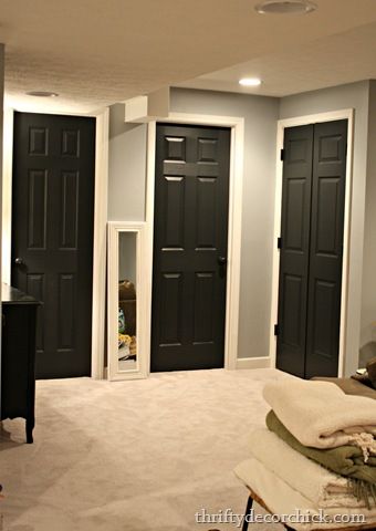 Black interior doors,  white trim through out house,  grey walls, white trim hall bathroom How To Paint Interior Doors, Paint Doors Black, Painting Interior Doors Black, Painted Interior Doors, Black Interior Doors, Thrifty Decor Chick, Black Doors, Grey Walls, Interior Doors