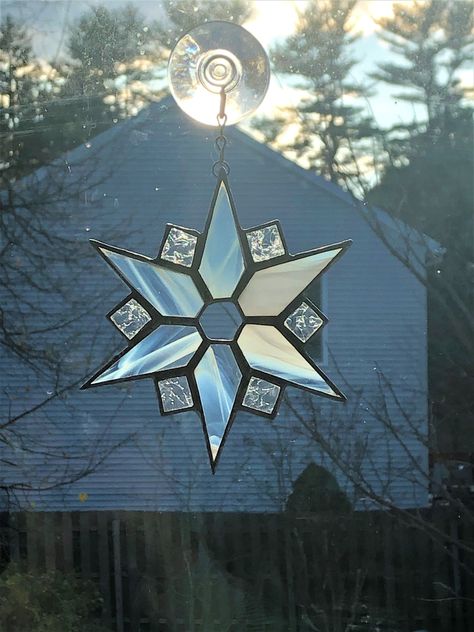 Our Snowflake suncatcher is an exquisite way to bring bright rays of sun inside your home. As part of our winter theme, this snowflake displays beautiful wispy whites and icy clear glass. This is a great gift for loved ones and can be hung as either an ornament or window décor. If you have any questions or concerns please feel free to contact us here on Etsy, or email us at Allcense.com@gmail.com. Instagram: @Allcense   -Free stuff: includes hardware for your new stained glass and incense cause Snowflake Suncatcher, House Warming Decor, Etching Diy, Stained Glass Gifts, Stained Glass Patterns Free, Stained Glass Ornaments, Stained Glass Suncatchers, Stained Glass Christmas, Stained Glass Suncatcher