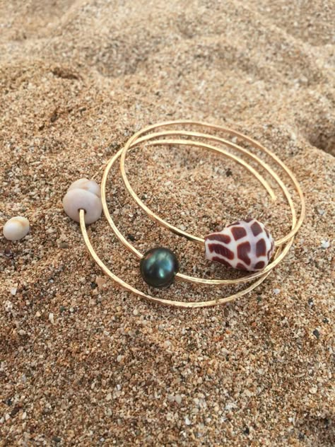 14g- 14K Gold Filled Maui sea shell and pearl bangles.-Hammered texture.  A classic hawaiian bangle set you will cherish for a lifetime. These beautiful seashells were found on the shores of Maui, Hawaii.  Made in Maui, Hawaii Surfer Girl Gifts, Pearl Bangles, Hammered Bracelet, Beachy Jewelry, Crystal Teardrop Earrings, Hawaiian Jewelry, Pearl Bangle, Pearl Hoop Earrings, Charm Pendant Necklace