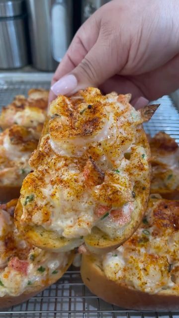 Seafood Recipes on Instagram: "SHRIMP AND CRAB GARLIC TOAST 🔥

🎥 by @nuocmamafoods

Follow @cuisineocn for more 🦀

• Garlic toast 
•1 lbs roughly chopped and whole shrimp 
•1 lbs roughly chopped immitation crab
(optional real crab) 
•1/2 cup chopped green onions or more if prefer.
•2 egg white from BA Jessica ( help filling get puffy and fluffy)
•1/2 cup mayonnaise
•1/2 teaspoon ground pepper 
•1 teaspoon sugar 
•1/2 teaspoon garlic salt 
•paprika 
Mix well together and refrigerated for 15 minutes. 
Preheat oven to 400f
1•Scoop a spoon full of filling on top (be generous, nobody wants toast with skimpy toppings). Sprinkle with paprika 
2•Place toast on top of cooling rack inside a baking pan. Or just line the baking rack with parchment paper. 
3•Bake for 20-25 minutes on the middle rack Recipes With Crab Meat, Recipes With Crab, Baking Rack, Garlic Toast, Be Generous, Cooling Rack, Naan Bread, Dessert Dishes, Egg White