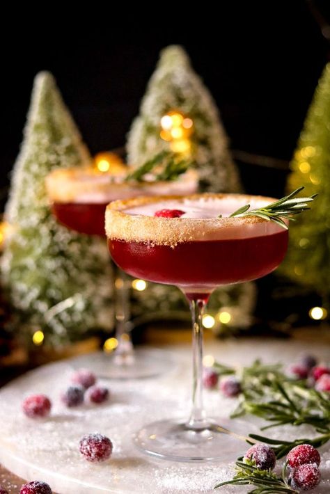 Festive and refreshing! Spiced rum mingles with cranberry, orange liqueur, and an infused maple simple syrup for a cozy and crisp winter cocktail. Spiced Simple Syrup Cocktails, Rosemary Christmas Cocktail, Cocktails With Cranberries, Rum Rum Rudolph, Cranberry Coctails Recipes, Spiced Cranberry Cocktail, Winter Brunch Cocktails, Vodka Cocktails Winter, Creamy Holiday Cocktails