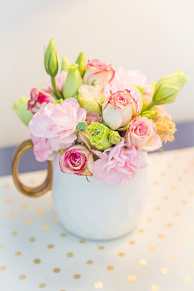 Flowers in a mug: http://www.stylemepretty.com/living/2015/04/13/a-sophisticated-city-themed-nursery/ | Photography: Threaded Together - http://threadedtogetherblog.com/ Teacup Flowers, Side Board, Flower Nursery, Garden Nursery, Pink Spring, Beautiful Flower Arrangements, Mors Dag, Spring Blooms, Floral Centerpieces