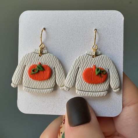 🥹So tiny. Very demure. Very cutesy. . Making tiny earring sweaters is honestly one of my favorite things in the fall and winter collections of handmade polymer clay earrings . These are both in the Fall Ya’ll Collection and in the shop now! . #polymerclay #polymerclayearrings #earringshop #handmadeearrings #handmadejewlery #fall #fallfashion Clay Earrings Ideas, Fall Polymer Clay Earrings, Tiny Earring, Sweater Earrings, Hobby Ideas, Handmade Jewlery, Tiny Earrings, Fall Sweaters, My Favorite Things