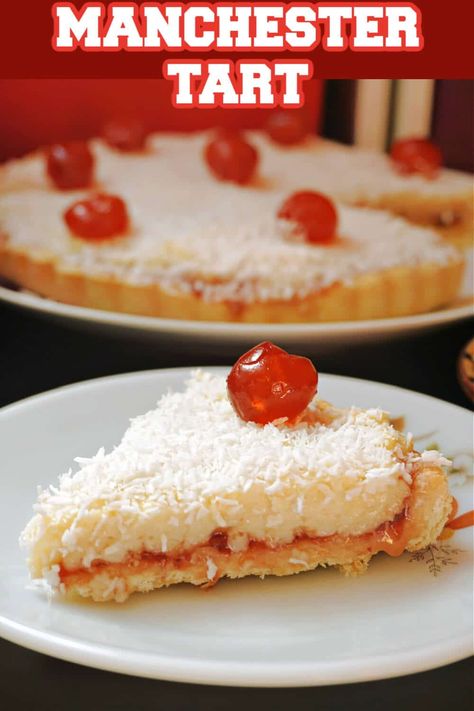 A delicious British pudding, this Manchester tart has a shortcrust pastry made from scratch, a layer of jam, a layer of custard, and it's then topped with desiccated coconut and Maraschino cherries. It's so scrumptious, and super easy to make too! Manchester Tart Recipe, School Puddings British, Macaroons Easy, Coconut Tart Recipe, Manchester Tart, Rainbow Pie, British Pudding, Slice Recipes, Work Recipes