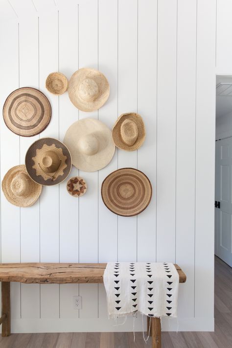 There’s a national day for just about everything and while we don’t typically acknowledge many of them, we had to give a little love to #NationalHatDay! Last week, we shared a stunning home tour with Mindy Gayer, which included this epic hat wall. Hat walls are such a fun way to incorporate fashion into your … Wall Hats, Hat Wall, Rustic Entryway, Hanging Hats, Hat Display, Surf Shack, Entry Way Design, Vintage Hats, Ship Lap Walls