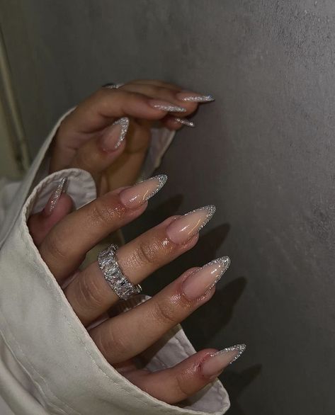 Outline Glitter Nails, Silver Jewel Nails, Sparkly Acrylic Nail Designs, Glitter Lines Nails, Almond Nails Sparkle Glitter, Sliver Almonds Nails, Winter Nails Silver Glitter, Silver Acyrilics Nails, Graduation Nails Silver