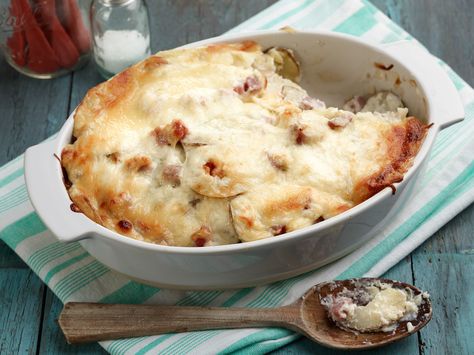 Scalloped Potatoes and Ham recipe from Ree Drummond via Food Network Scalloped Potatoes And Ham Recipe, Scalloped Potato Recipe, Potatoes And Ham, Scalloped Potato, Best Potato Recipes, Scalloped Potatoes And Ham, Ham Casserole, Leftover Ham Recipes, Ham Recipe