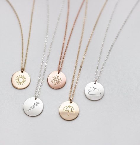 Cute gift for weather nerds and aspiring meteorologists. Gold, rose gold, and silver necklaces engraved with sun, clouds, snow, lightning bolt, and an umbrella. #giftideas 15 Gift Ideas, Weather Tools, Sun Clouds, Stained Glass Jewelry, Rose Gold And Silver, Necklace Cute, 15 Gifts, Perfect Weather, Engraved Necklace