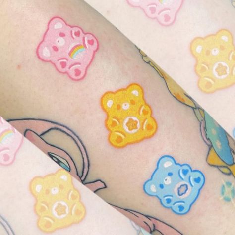 Gummy Care Bear Tattoo, Carebear Matching Tattoos, Colorful Cartoon Tattoos, Togapee Pokemon Tattoo, Kawaii Hand Tattoo, Cartoon Style Tattoos, Sanrio Tattoo Ideas, Cute Anime Tattoos, Kawaii Flash Tattoo