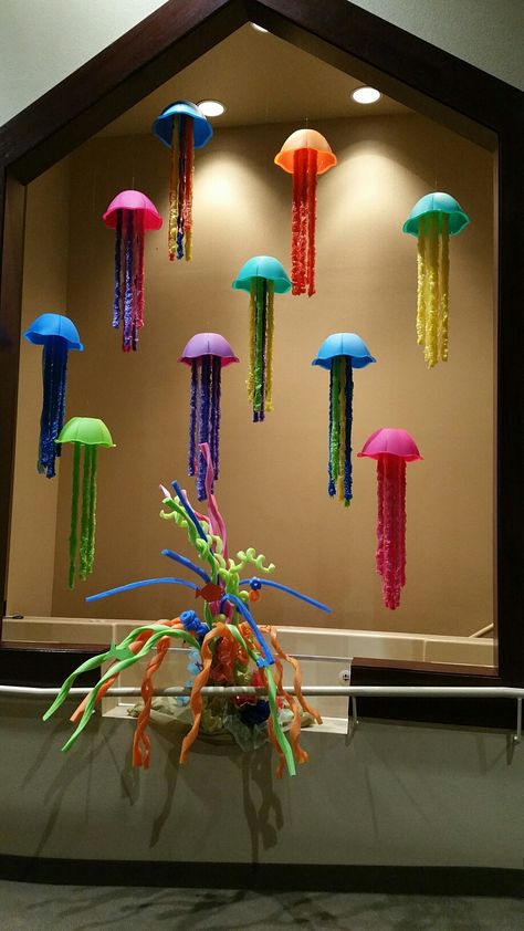 Pool Noodle Fish Craft, Jelly Fish Decoration Diy, Ocean Themed Decorations, Zoomerang Vbs Decor, Tide Pool Decorations, Jelly Fish Decoration, Scuba Decorations, Beach Theme Crafts, Jelly Fish Craft