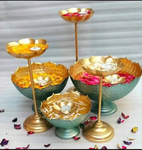 3 urli bowls 3 lotus stands 3 small votives Complete set of 9 pieces Size : Urli bowl 12 10 8 inch Stands 14 12 10 inch Small votives 4 inch Price ₹1700 complete set free shipping New rates😍 Big stocks Urli Bowl, Kids Handicraft, Silver Pooja Items, Metal Bowl, Gold Chain With Pendant, Bowl Designs, Indian Festivals, Family Celebrations, Floating Candles