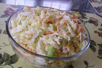 Hawaiian Coleslaw Recipe | Allrecipes Hawaiian Coleslaw Recipe, Grilled Hotdogs, Hawaiian Coleslaw, Traditional Coleslaw Recipe, Sweet Salad, Barbecue Burgers, Cabbage Varieties, Chicken Dressing, Kentucky Fried Chicken