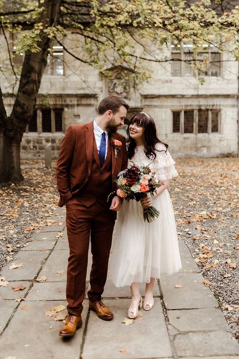 Cute couple portrait of bride in Needle and Thread bridal separates and groom in three piece burgundy suit for city wedding Groom In Burgundy, Registry Office Wedding Dress, Needle And Thread Bridal, Christian Photography, Registry Office Wedding, White Bridesmaid, Budget Friendly Wedding, White Bridesmaid Dresses, Burgundy Suit