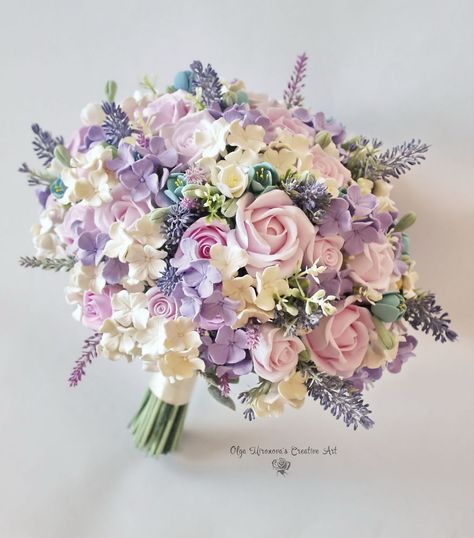 I Make Clay Bouquets That Brides Can Keep Forever | Bored Panda Enchanted Garden Bouquet, Lilac Bouquet Quinceanera, Tangled Inspired Bouquet, Wedding Bouquets Bride Purple, Xv Bouquet Flower, Beautiful Wedding Bouquets Brides, Bouquet For Graduation, Flowers For Wedding Bouquet, Flower Bouquet Bride