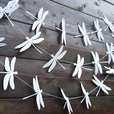 A new dragonfly garland for any kind of event ✨ https://thepurpledream.etsy.com/listing/1731918239 . . . #babyshower #babyshowerdecor #babyshowergarland #dragonflybabyshower #dragonflygarland #birthdaypartydecor #birthdaybanner #birthdaygarland #dragonflydecor #fairybabyshower #fairybirthdayparty #fairybirthday #fairythemeparty Dragonfly Bedroom Ideas, Dragonfly Classroom Theme, Fairy Core Party Decor, Frog Themed Birthday Party Decorations, Fairy Classroom Theme, Dragonfly Garland, Cricut Baby Shower Decorations, Dragonfly Wedding Theme, Dragonfly Birthday Party