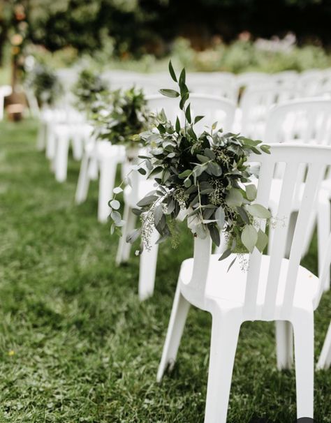 Folding Chair Decorations Wedding Outdoor Ceremony, Plastic White Chairs Wedding, Plastic Wedding Chairs, Plastic Chair Wedding Ceremony, White Chair Decor, Aisle Garden Wedding, Simple Isle Decorations Wedding Outdoor Ceremony, Outdoor Wedding Chairs Ceremony Seating Aisle Decorations, Asile Wedding Ideas Outdoor