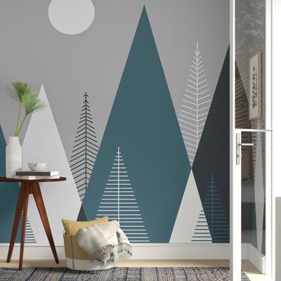 Get a fresh look without putting down any paint with this non-pasted wallpaper. Made from paper with a matte finish, it features a geometric pattern with tall triangles forming mountains and trees in shades of blue, white, and gray. Non-pasted wallpaper offers the chance to make a lasting upgrade to your bedroom, living room, or accent wall. Installation is easy: Simply paint adhesive on your desired wall, press the paper onto a smooth surface, and align the pattern from panel to panel. Our favo Scandinavian Wallpaper, Mountain Wallpaper, Style Deco, Boy Bedroom, Childrens Room Decor, Wallpaper Bedroom, Geometric Wallpaper, Geometric Wall, Kids Wallpaper