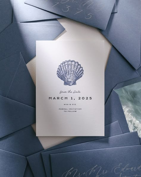 A closer look at our ocean-themed Save the Date 🌊 🐚 She’s called ‘Marblehead’ and we created her for all those couples out there who simply can’t get enough of that beach life 🏖️ The Save the Date is adorned with a blue watercolor seashell. As you can see in the other photos we’ve also created a sea shell vellum wrap to compliment it perfectly. If you really want to up your save-the-date game why not pair it with some dusty blue envelopes 💙, an ocean-themed envelope liner 🌊, and jelly fish... Beachy Wedding Invites, Coastal Save The Date Ideas, Beach Wedding Save The Date Ideas, Nautical Save The Date, Wedding Sea Theme, Beachy Wedding Invitations, Coastal Save The Date, Ocean Blue Wedding Theme, Sea Wedding Theme