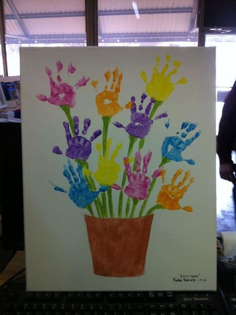 #11 CHILDREN CAN USE THE PALM OF THEIR HANDS DIPPED IN COLORING TO IMITATE VARIOUS PIGMENTED FLOWERS ON INDIVIDUAL STEMS IN A PLANT POT Kunst For Barn, Hand Print Art, Flower Pot Art, Footprint Art, Handprint Crafts, Daycare Crafts, Handprint Art, Easter Crafts For Kids, Childrens Crafts