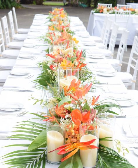 Grace Flowers Hawaii | Throwback Tuesday (they both start with T, it works ;)) Lush orange long and low tropical nouveau designs. @maunakeahotel… | Instagram Tropical Color Wedding, Hawaii Table Decorations, Coastal Theme Party Decor, Low Tropical Centerpiece, Tropical Table Scape, Elegant Tropical Wedding Decor, Tropical Centerpiece Ideas, Tropical Table Centerpieces, Hawaiian Centerpiece Ideas