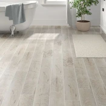 Itona Tile Hereford 6" x 36" Porcelain Wood Look Wall & Floor Tile | Wayfair Tile That Looks Like Hardwood Floor, Modern Craftsman Flooring, Bathroom Floor Tile Wood Look, Sand Floor Tiles, Farmhouse Flooring Tile, Tile And Wood Floors Combo Kitchen, Coastal Tile Flooring, Tile Kitchen Floor Next To Hardwood, Woodlike Tile Floors