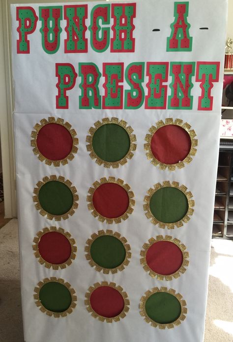 Punch-a-Present Christmas Eve game with 12 compartments for party favor prizes. #pinterestcometolife #christmas #diy #crafts Christmas Cup Punch Game, Christmas Prize Punch Board, Punch A Present Diy, Punch Christmas Tree Game, Punch A Prize Christmas, Christmas Party Favors For Family, Party Game Gift Ideas, Small Prizes For Christmas Games, Punch Prize Board Diy