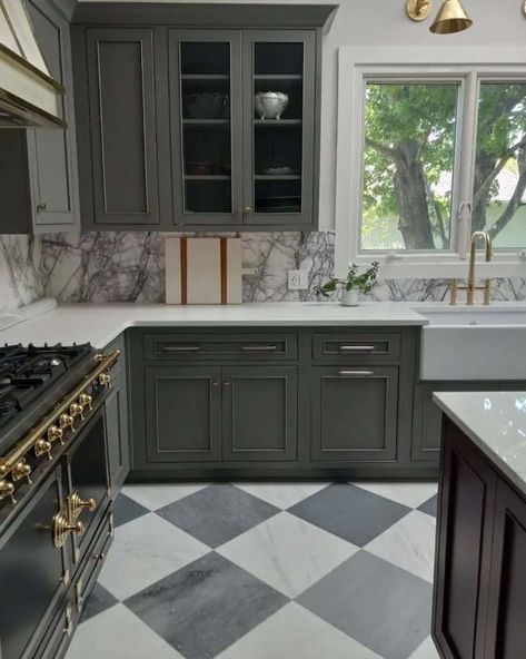 Where to use the checkerboard floor trend in your home - Farmhousehub Checkerboard Kitchen Floor Tile, Modern Checkered Floor Kitchen, Green Cabinets Black And White Floor, Kitchen Checked Floor, Kitchen Tile Floors Ideas, Black And White Checked Kitchen Floor, Kitchens With Checkerboard Floors, Green Kitchen Cabinets Checkered Floor, Kitchens With Checkered Floors