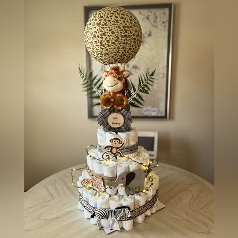 Nwot- Handmade Safari/ Jungle Themed Diaper Cakes. Great For A Baby Shower Gift Or To Use As A Centerpiece Piece On The Gift Table At The Shower! The Cake Also Has Lighted Leaf Garland And Includes A Precious Moments Brand Stuffed Giraffe For Baby! Diaper Used Are Pampers Swaddlers Sizes 3 And 4. Giraffe Baby Shower Centerpieces, Safari Diaper Cake Boy, Safari Jungle Baby Shower Ideas, Welcome To The Jungle Baby Shower Theme, Safari Centerpieces Baby Shower Ideas, Zoo Themed Baby Shower Ideas, Giraffe Baby Shower Theme Boy, Giraffe Themed Baby Shower Ideas, Wild One Baby Shower Theme